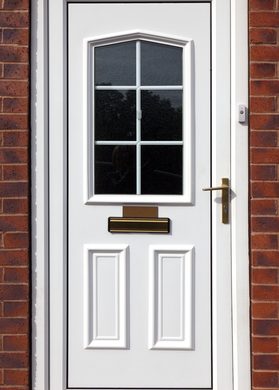 Close up of a white door