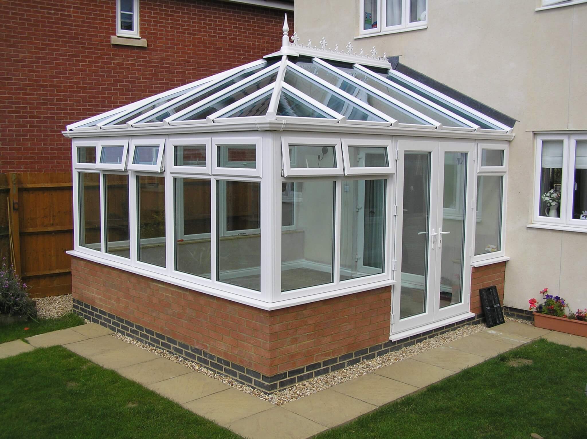 A medium shot of a white conservatory