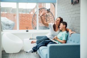 Mum and Son taking a selfie in their new conservatory