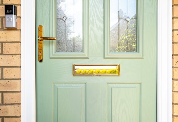 composite light green door from the front