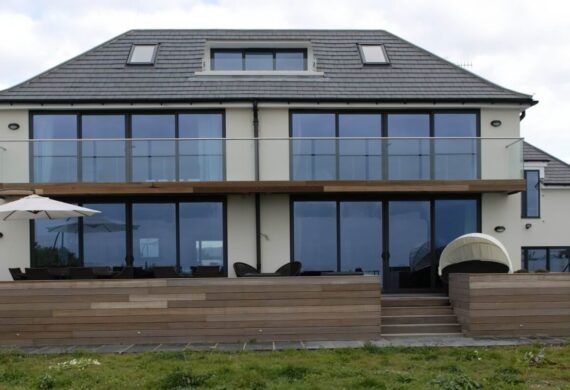 Aluminium doors and windows with slim modern frames installed on a contemporary home.